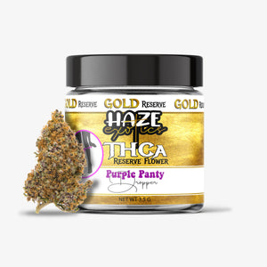 Jar of Gold Reserve Haze THCA flower with a gold label on a white background